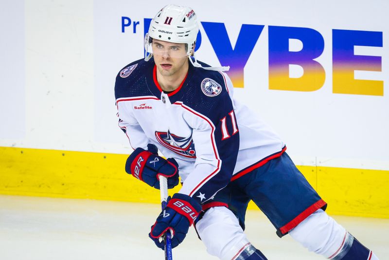 Jan 25, 2024; Calgary, Alberta, CAN; Columbus Blue Jackets center Adam Fantilli (11) skates during the warmup period against the Calgary Flames at Scotiabank Saddledome. Mandatory Credit: Sergei Belski-USA TODAY Sports