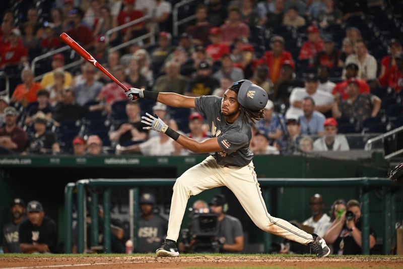 Jul 5, 2024; Washington, District of Columbia, USA; Washington Nationals center fielder James Wood (29) watches the ball after making contact against the St. Louis Cardinals during the ninth inning at Nationals Park. Mandatory Credit: Rafael Suanes-USA TODAY Sports