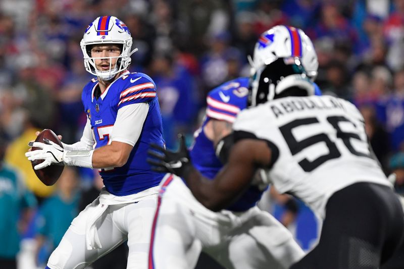 Buffalo Bills quarterback Josh Allen (17) prepares to throw a pass during the first half of an NFL football game against the Jacksonville Jaguars, Monday, Sept. 23, 2024, in Orchard Park, NY. (AP Photo/Adrian Kraus)