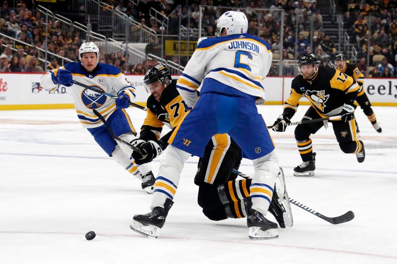 Jan 6, 2024; Pittsburgh, Pennsylvania, USA;  Buffalo Sabres defenseman Erik Johnson (6) checks Pittsburgh Penguins center Evgeni Malkin (71) during the third period at PPG Paints Arena. Buffalo won 3-1. Mandatory Credit: Charles LeClaire-USA TODAY Sports