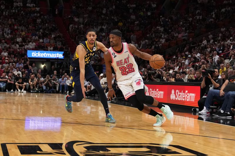 MIAMI, FL - FEBRUARY 8: Jimmy Butler #22 of the Miami Heat dribbles the ball during the game against the Indiana Pacers on February 8, 2023 at Miami-Dade Arena in Miami, Florida. NOTE TO USER: User expressly acknowledges and agrees that, by downloading and or using this Photograph, user is consenting to the terms and conditions of the Getty Images License Agreement. Mandatory Copyright Notice: Copyright 2023 NBAE (Photo by Eric Espada/NBAE via Getty Images)