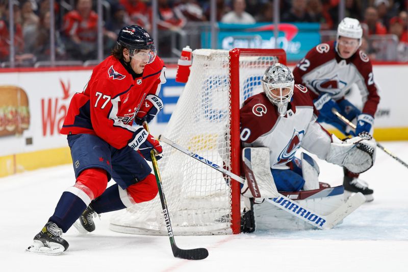 Feb 13, 2024; Washington, District of Columbia, USA; Washington Capitals right wing T.J. Oshie (77) skates in on Colorado Avalanche goaltender Alexandar Georgiev (40) in the third period at Capital One Arena. Mandatory Credit: Geoff Burke-USA TODAY Sports