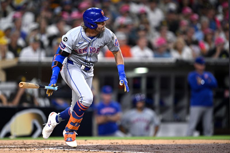 Aug 22, 2024; San Diego, California, USA; New York Mets right fielder Jeff McNeil (1) hits an RBI single against the San Diego Padres during the fourth inning at Petco Park. Mandatory Credit: Orlando Ramirez-USA TODAY Sports