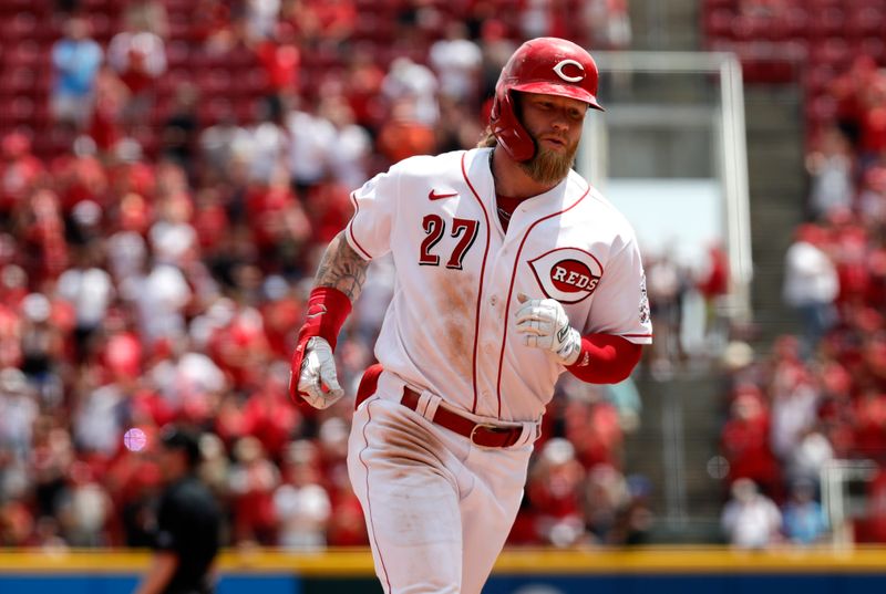 Jun 21, 2023; Cincinnati, Ohio, USA; Cincinnati Reds right fielder Jake Fraley (27) runs the bases after hitting a two-run home run against the Colorado Rockies during the eighth inning at Great American Ball Park. Mandatory Credit: David Kohl-USA TODAY Sports