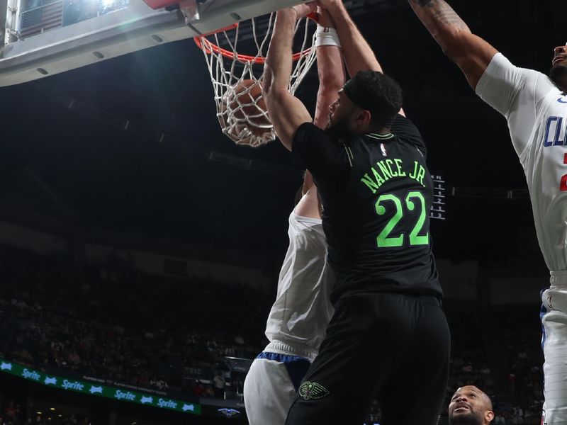 NEW ORLEANS, LA - MARCH 15: Larry Nance Jr. #22 of the New Orleans Pelicans dunks the ball during the game against the LA Clippers on March 15, 2024 at the Smoothie King Center in New Orleans, Louisiana. NOTE TO USER: User expressly acknowledges and agrees that, by downloading and or using this Photograph, user is consenting to the terms and conditions of the Getty Images License Agreement. Mandatory Copyright Notice: Copyright 2024 NBAE (Photo by Layne Murdoch Jr./NBAE via Getty Images)