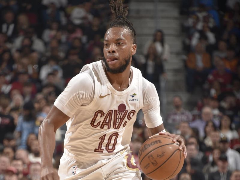 CLEVELAND, OH - MARCH 11: Darius Garland #10 of the Cleveland Cavaliers handles the ball during the game against the Phoenix Suns on March 11, 2024 at Rocket Mortgage FieldHouse in Cleveland, Ohio. NOTE TO USER: User expressly acknowledges and agrees that, by downloading and/or using this Photograph, user is consenting to the terms and conditions of the Getty Images License Agreement. Mandatory Copyright Notice: Copyright 2024 NBAE (Photo by David Liam Kyle/NBAE via Getty Images)