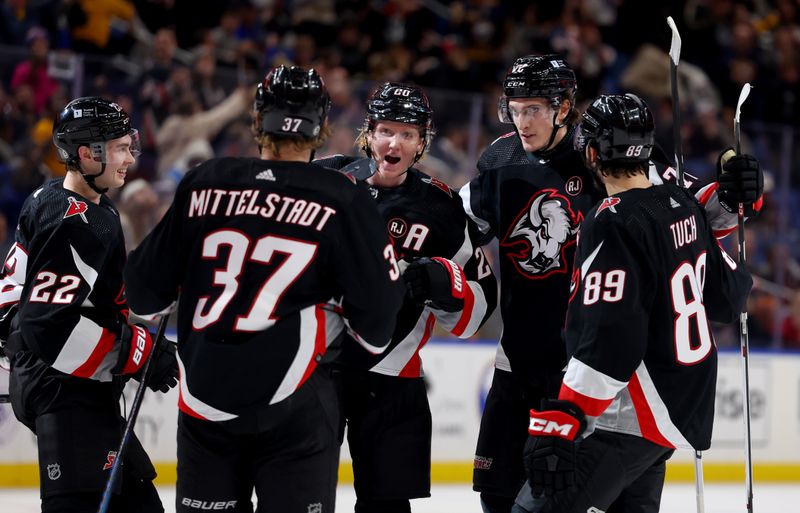 Jan 11, 2024; Buffalo, New York, USA;  Buffalo Sabres right wing Tage Thompson (72) celebrates his second goal of the game with teammates during the first period against the Ottawa Senators at KeyBank Center. Mandatory Credit: Timothy T. Ludwig-USA TODAY Sports