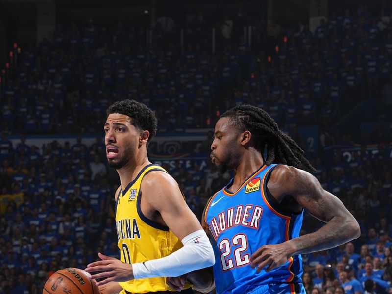 OKLAHOMA CITY, OK - JUNE 8: Tyrese Haliburton #0 of the Indiana Pacers dribbles the ball during the game against the Oklahoma City Thunder  during Game Two of the 2025 NBA Finals on June 8, 2025 at Paycom Center in Oklahoma City, Oklahoma. NOTE TO USER: User expressly acknowledges and agrees that, by downloading and or using this photograph, User is consenting to the terms and conditions of the Getty Images License Agreement. Mandatory Copyright Notice: Copyright 2025 NBAE (Photo by Jesse D. Garrabrant/NBAE via Getty Images)