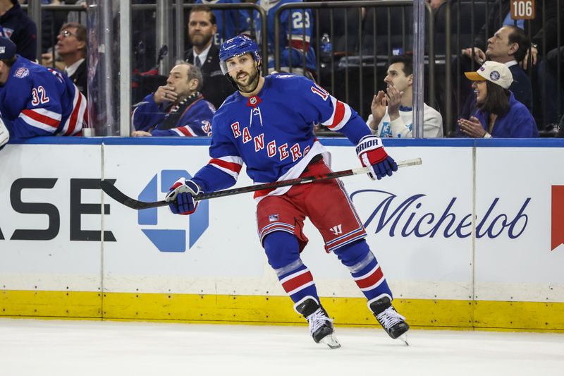 Feb 28, 2026; New York, New York, USA;  New York Rangers center Vincent Trocheck (16) reacts after scoring a goal during a shootout against the Pittsburgh Penguins at Madison Square Garden. Mandatory Credit: Wendell Cruz-Imagn Images
