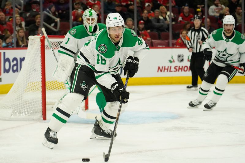 Nov 27, 2024; Chicago, Illinois, USA; Dallas Stars defenseman Ilya Lyubushkin (46) brings the puck up the ice against the Chicago Blackhawks during the third period at United Center. Mandatory Credit: David Banks-Imagn Images