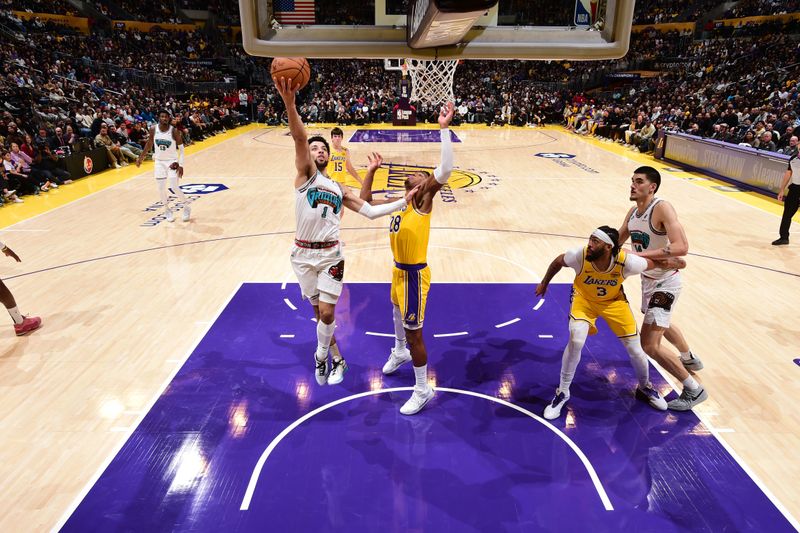 LOS ANGELES, CA - NOVEMBER 13: Scotty Pippen Jr. #1 of the Memphis Grizzlies drives to the basket during the game against the Los Angeles Lakers on November 13, 2024 at Crypto.Com Arena in Los Angeles, California. NOTE TO USER: User expressly acknowledges and agrees that, by downloading and/or using this Photograph, user is consenting to the terms and conditions of the Getty Images License Agreement. Mandatory Copyright Notice: Copyright 2024 NBAE (Photo by Adam Pantozzi/NBAE via Getty Images)