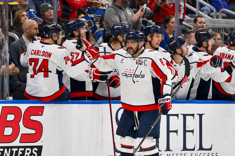 Nov 9, 2024; St. Louis, Missouri, USA;  Washington Capitals left wing Alex Ovechkin (8) is congratulated by teammates after scoring against the St. Louis Blues during the second period at Enterprise Center. Mandatory Credit: Jeff Curry-Imagn Images