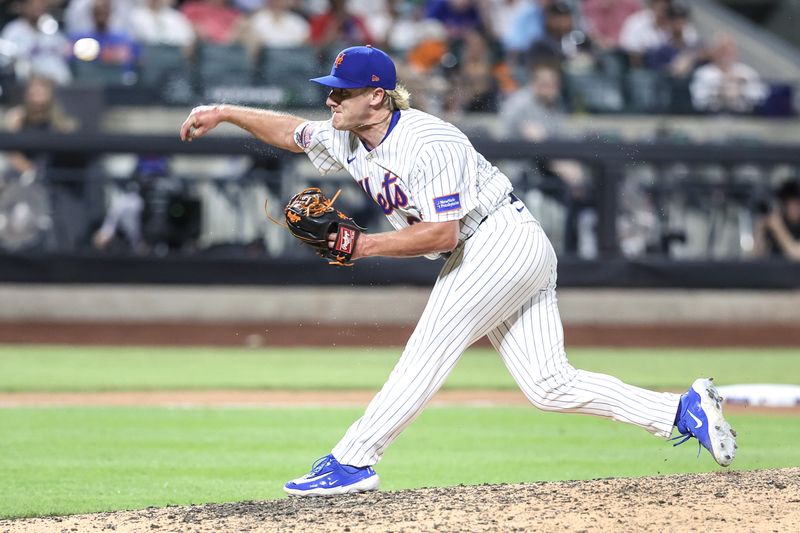 Jun 25, 2025; New York City, New York, USA;  New York Mets relief pitcher Jonathan Pintaro (91) pitches in the ninth inning making his Major League debut against the Atlanta Braves at Citi Field. Mandatory Credit: Wendell Cruz-Imagn Images
