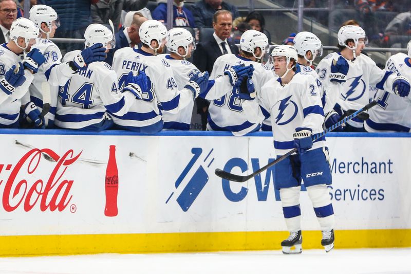 Feb 24, 2024; Elmont, New York, USA;  Tampa Bay Lightning center Brayden Point (21) celebrates with his teammates after scoring a goal in the second period against the New York Islanders at UBS Arena. Mandatory Credit: Wendell Cruz-USA TODAY Sports