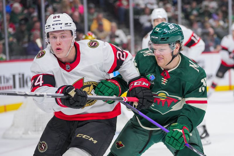 Apr 2, 2024; Saint Paul, Minnesota, USA; Ottawa Senators defenseman Jacob Bernard-Docker (24) and Minnesota Wild center Mason Shaw (15) skate after the puck in the second period at Xcel Energy Center. Mandatory Credit: Brad Rempel-USA TODAY Sports