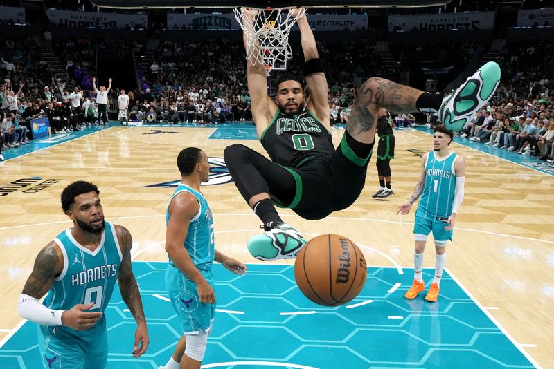 CHARLOTTE, NORTH CAROLINA - NOVEMBER 02: Jayson Tatum #0 of the Boston Celtics dunks against the Charlotte Hornets during the second half of the game at Spectrum Center on November 02, 2024 in Charlotte, North Carolina. NOTE TO USER: User expressly acknowledges and agrees that, by downloading and or using this photograph, User is consenting to the terms and conditions of the Getty Images License Agreement.  (Photo by Grant Halverson/Getty Images)