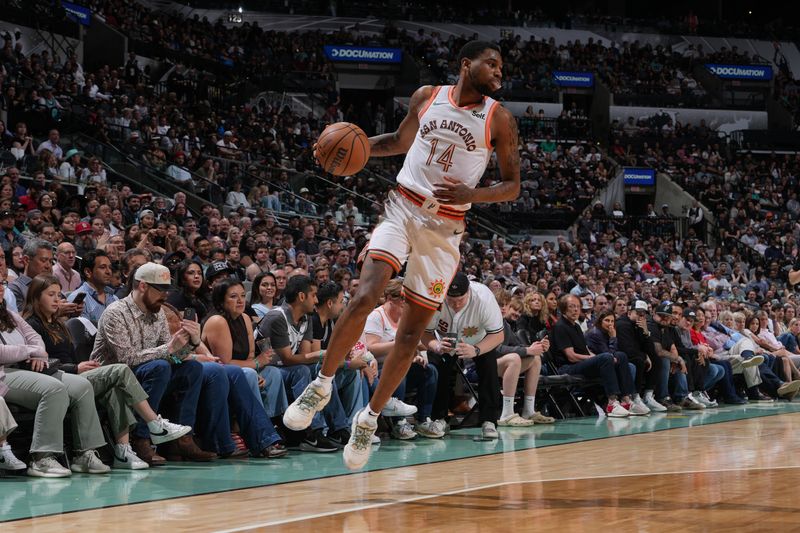 SAN ANTONIO, TX - MARCH 25: Blake Wesley #14 of the San Antonio Spurs dribbles the ball during the game against the Phoenix Suns on March 25, 2024 at the AT&T Center in San Antonio, Texas. NOTE TO USER: User expressly acknowledges and agrees that, by downloading and or using this photograph, user is consenting to the terms and conditions of the Getty Images License Agreement. Mandatory Copyright Notice: Copyright 2024 NBAE (Photos by Jesse D. Garrabrant/NBAE via Getty Images)