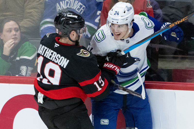 Jan 13, 2026; Ottawa, Ontario, CAN; Ottawa Senators right wing Drake Batherson (19) checks Vancouver Canucks defenseman Zeev Buium (24) in the third period at the Canadian Tire Centre. Mandatory Credit: Marc DesRosiers-IMAGN Images