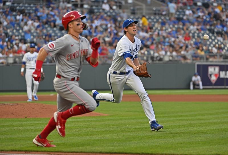 Jun 14, 2023; Kansas City, Missouri, USA;  Cincinnati Reds second baseman Matt McLain (9) beats the toss by Kansas City Royals starting pitcher Daniel Lynch (52) to first base for a hit, in the fourth inning against at Kauffman Stadium. Mandatory Credit: Peter Aiken-USA TODAY Sports