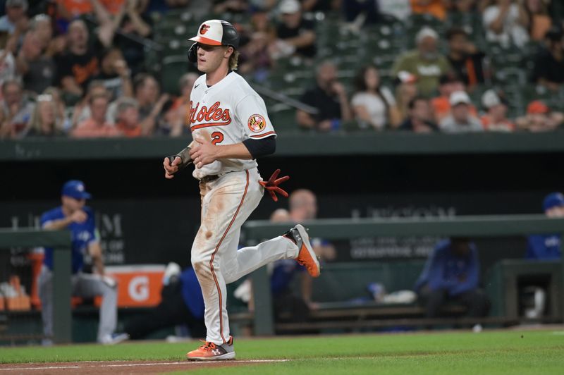 Aug 23, 2023; Baltimore, Maryland, USA;  Baltimore Orioles third baseman Gunnar Henderson (2) scores during the third inning against the Toronto Blue Jays at Oriole Park at Camden Yards. Mandatory Credit: Tommy Gilligan-USA TODAY Sports