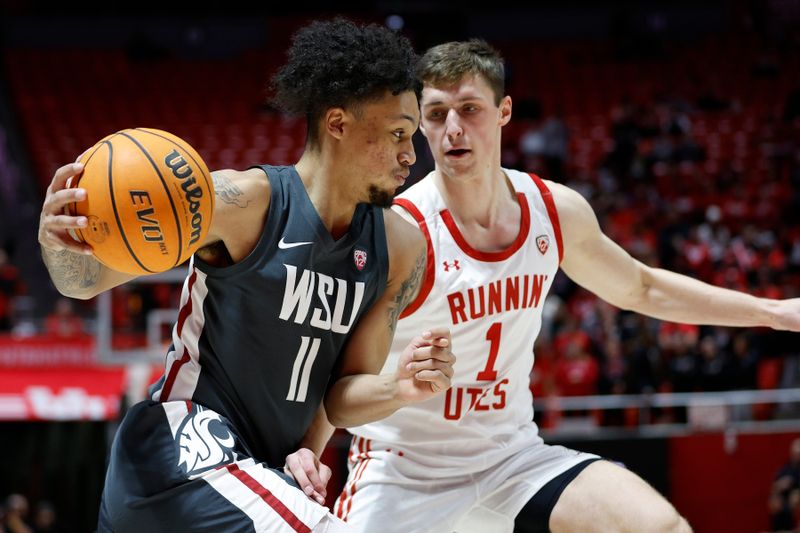 Jan 19, 2023; Salt Lake City, Utah, USA; Washington State Cougars forward DJ Rodman (11) drives against Utah Utes forward Ben Carlson (1) in the first half at Jon M. Huntsman Center. Mandatory Credit: Jeffrey Swinger-USA TODAY Sports