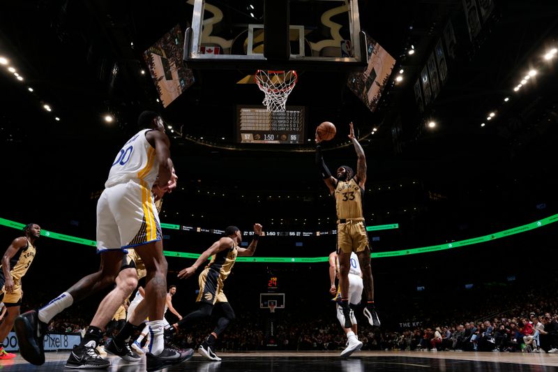 TORONTO, CANADA - MARCH 1:  Gary Trent Jr. #33 of the Toronto Raptors grabs the rebound during the game on March 1, 2024 at the Scotiabank Arena in Toronto, Ontario, Canada.  NOTE TO USER: User expressly acknowledges and agrees that, by downloading and or using this Photograph, user is consenting to the terms and conditions of the Getty Images License Agreement.  Mandatory Copyright Notice: Copyright 2024 NBAE (Photo by Mark Blinch/NBAE via Getty Images)