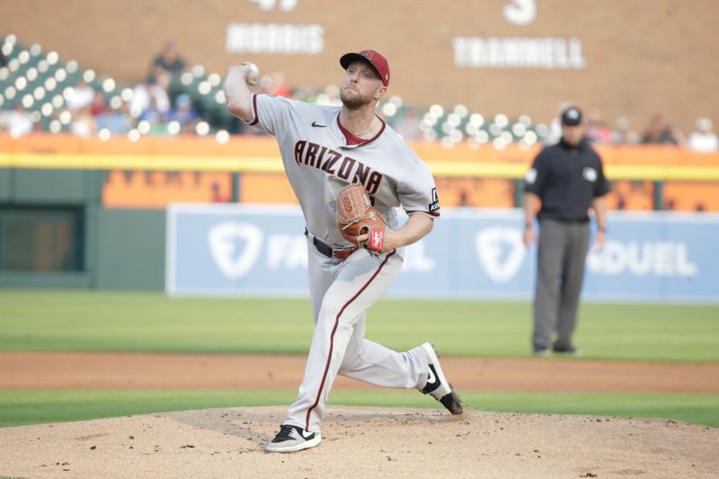 Jun 9, 2023; Detroit, Michigan, USA; Arizona Diamondbacks starting pitcher Merrill Kelly (29) pitches during the second inning of the game against the Detroit Tigers at Comerica Park. Mandatory Credit: Brian Bradshaw Sevald-USA TODAY Sports