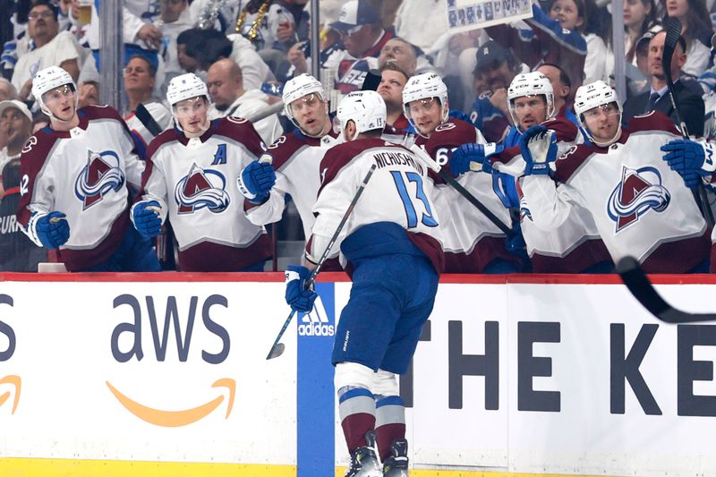 Apr 30, 2024; Winnipeg, Manitoba, CAN; Colorado Avalanche right wing Valeri Nichushkin (13) celebrates his first period goal against the Winnipeg Jets in game five of the first round of the 2024 Stanley Cup Playoffs at Canada Life Centre. Mandatory Credit: James Carey Lauder-USA TODAY Sports