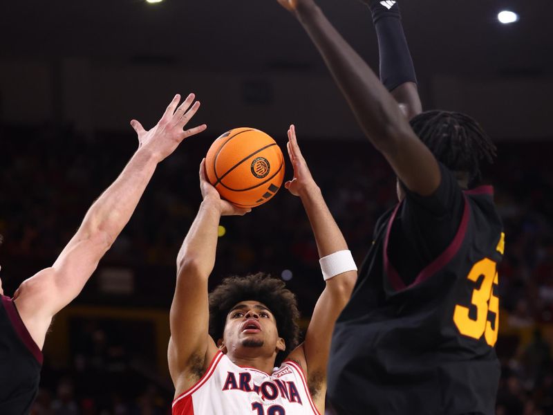 Jan 31, 2026; Tempe, Arizona, USA; Arizona Wildcats forward Koa Peat (10) against the Arizona State Sun Devils in the first half at Desert Financial Arena. Mandatory Credit: Mark J. Rebilas-Imagn Images