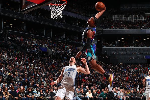 BROOKLYN, NY - DECEMBER 2: Dennis Smith Jr. #4 of the Brooklyn Nets dunks the ball during the game against the Orlando Magic on December 2, 2023 at Barclays Center in Brooklyn, New York. NOTE TO USER: User expressly acknowledges and agrees that, by downloading and or using this Photograph, user is consenting to the terms and conditions of the Getty Images License Agreement. Mandatory Copyright Notice: Copyright 2023 NBAE (Photo by David L. Nemec/NBAE via Getty Images)