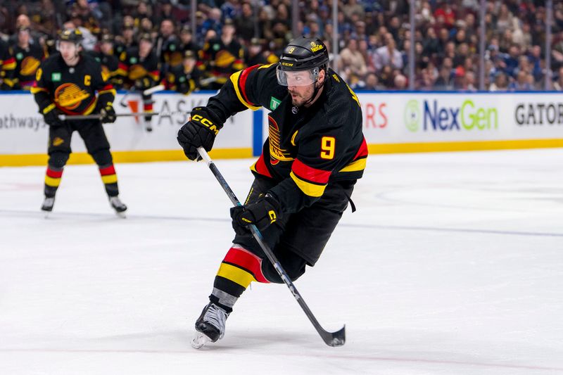 Mar 25, 2024; Vancouver, British Columbia, CAN; Vancouver Canucks forward J.T. Miller (9) shoots against the Los Angeles Kings in the third period at Rogers Arena. Kings won 3 -2. Mandatory Credit: Bob Frid-USA TODAY Sports