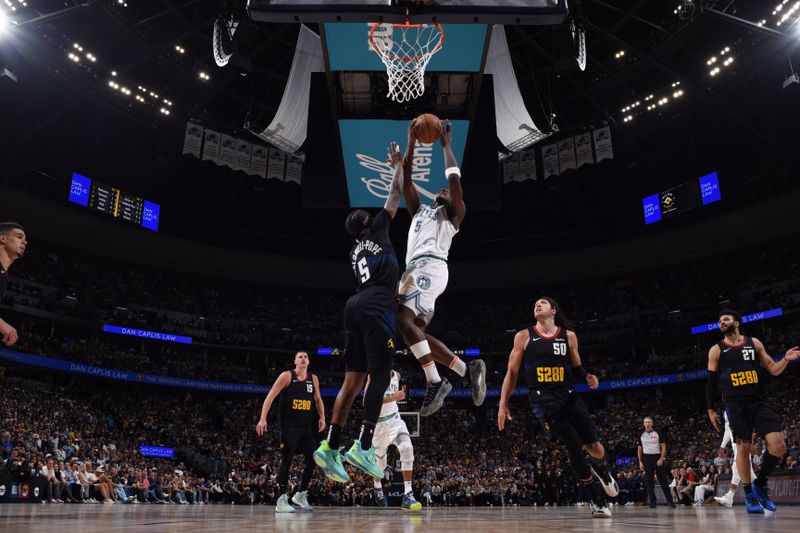 DENVER, CO - MAY 19:  Anthony Edwards #5 of the Minnesota Timberwolves goes to the basket during the game against the Denver Nuggets during Round 2 Game 7 of the 2024 NBA Playoffs  on May 19, 2024 at the Ball Arena in Denver, Colorado. NOTE TO USER: User expressly acknowledges and agrees that, by downloading and/or using this Photograph, user is consenting to the terms and conditions of the Getty Images License Agreement. Mandatory Copyright Notice: Copyright 2024 NBAE (Photo by Garrett Ellwood/NBAE via Getty Images)