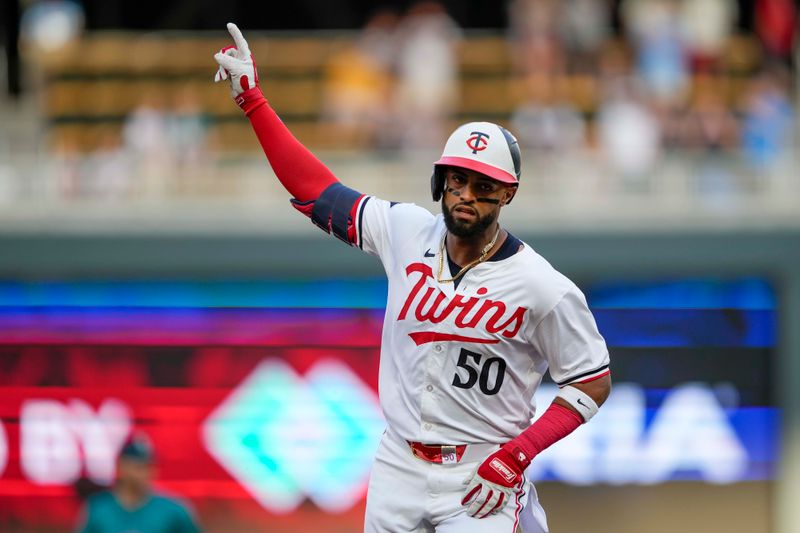 May 8, 2024; Minneapolis, Minnesota, USA; Minnesota Twins center fielder Willi Castro (50) celebrates after hitting a solo home run against the Seattle Mariners in the second inning at Target Field. Mandatory Credit: Jesse Johnson-USA TODAY Sports