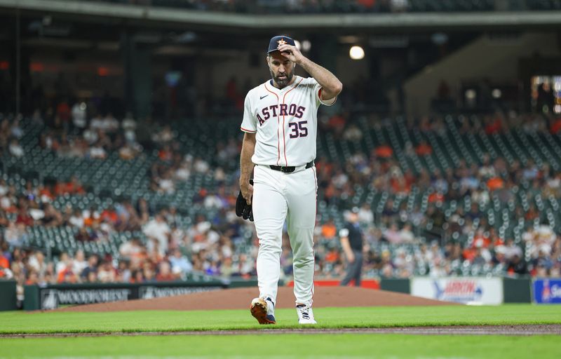 May 1, 2024; Houston, Texas, USA;  Houston Astros starting pitcher Justin Verlander (35) walks off the field after pitching during the first inning against the Cleveland Guardians at Minute Maid Park. Mandatory Credit: Troy Taormina-USA TODAY Sports