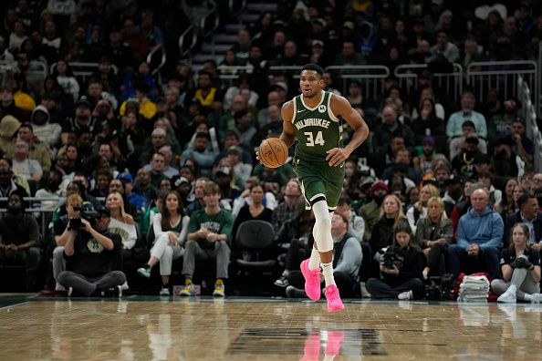 MILWAUKEE, WISCONSIN - OCTOBER 30: Giannis Antetokounmpo #34 of the Milwaukee Bucks dribbles the ball against the Miami Heat during the first half at Fiserv Forum on October 30, 2023 in Milwaukee, Wisconsin. NOTE TO USER: User expressly acknowledges and agrees that, by downloading and or using this photograph, User is consenting to the terms and conditions of the Getty Images License Agreement. (Photo by Patrick McDermott/Getty Images)