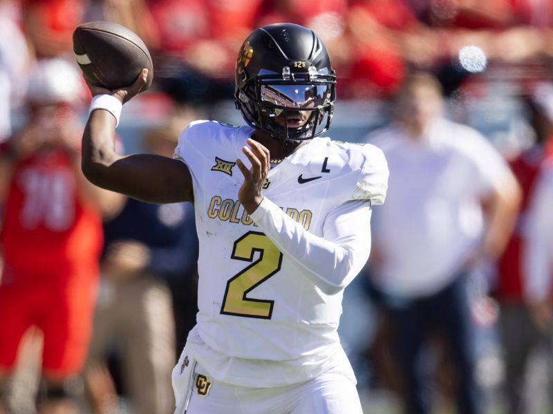 Oct 19, 2024; Tucson, Arizona, USA; Colorado Buffalos quarterback Shedeur Sanders (2) against the Arizona Wildcats in the first half at Arizona Stadium. Mandatory Credit: Mark J. Rebilas-Imagn Images