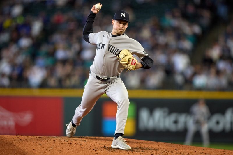 May 14, 2025; Seattle, Washington, USA; New York Yankees pitcher Will Warren (98) throws against the Seattle Mariners during the third inning at T-Mobile Park. Mandatory Credit: John Froschauer-Imagn Images