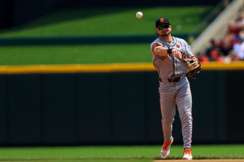 Aug 4, 2024; Cincinnati, Ohio, USA; San Francisco Giants second baseman Brett Wisely (0) throws to first to get Cincinnati Reds catcher Tyler Stephenson (not pictured) out in the seventh inning at Great American Ball Park. Mandatory Credit: Katie Stratman-USA TODAY Sports