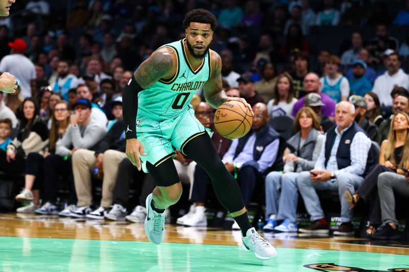 CHARLOTTE, NORTH CAROLINA - NOVEMBER 16: Miles Bridges #0 of the Charlotte Hornets controls the ball during the first half of a basketball game against the Milwaukee Bucks at Spectrum Center on November 16, 2024 in Charlotte, North Carolina. NOTE TO USER: User expressly acknowledges and agrees that, by downloading and or using this photograph, User is consenting to the terms and conditions of the Getty Images License Agreement. (Photo by David Jensen/Getty Images)