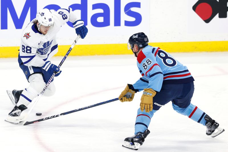 Jan 27, 2024; Winnipeg, Manitoba, CAN; Toronto Maple Leafs right wing William Nylander (88) is stick checked by Winnipeg Jets defenseman Nate Schmidt (88) in the third period at Canada Life Centre. Mandatory Credit: James Carey Lauder-USA TODAY Sports