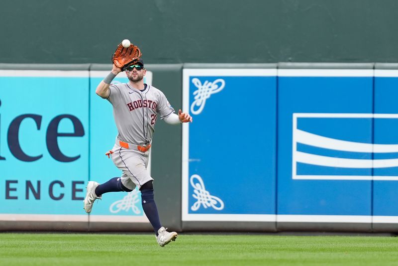 Aug 24, 2025; Baltimore, Maryland, USA; Houston Astros center fielder Chas McCormick (20) catches a fly ball hit by Baltimore Orioles second baseman Luis Vazquez (52) (not pictured) during the fifth inning at Oriole Park at Camden Yards. Mandatory Credit: Gregory Fisher-Imagn Images