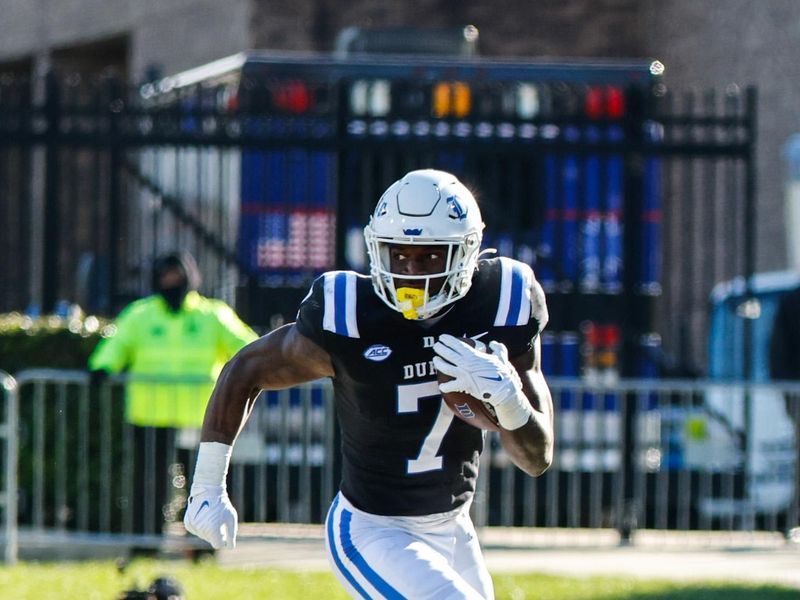 Nov 25, 2023; Durham, North Carolina, USA; Duke Blue Devils running back Jordan Waters (7) runs with the tball towards the end zone during the second half of the game against Pittsburgh Panthers at Wallace Wade Stadium.  Mandatory Credit: Jaylynn Nash-USA TODAY Sports