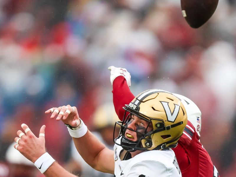 Nov 11, 2023; Columbia, South Carolina, USA; Vanderbilt Commodores wide receiver Richie Hoskins (15) cannot catch a pass against South Carolina Gamecocks defensive back O'Donnell Fortune (3) in the second quarter at Williams-Brice Stadium. Mandatory Credit: Jeff Blake-USA TODAY Sports