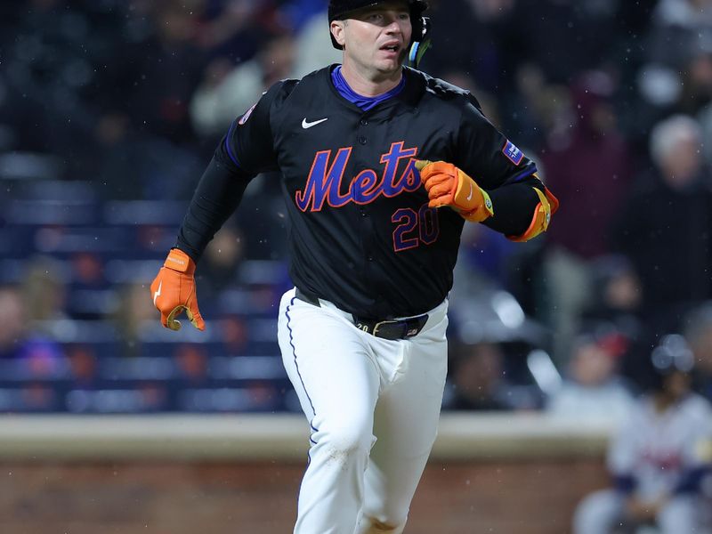 May 10, 2024; New York City, New York, USA; New York Mets first baseman Pete Alonso (20) runs to first after hitting an RBI single against the Atlanta Braves during the ninth inning at Citi Field. Mandatory Credit: Brad Penner-USA TODAY Sports