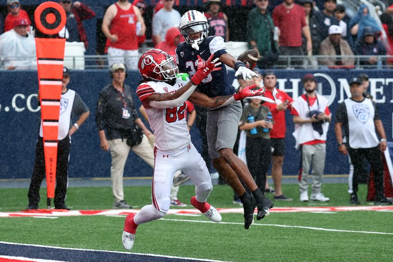 Nov 18, 2023; Tucson, Arizona, USA; Arizona Wildcats cornerback Tacario Davis (23) blocks a pass against Utah Utes tightend Landen King (82) during the first half at Arizona Stadium. Mandatory Credit: Zachary BonDurant-USA TODAY Sports