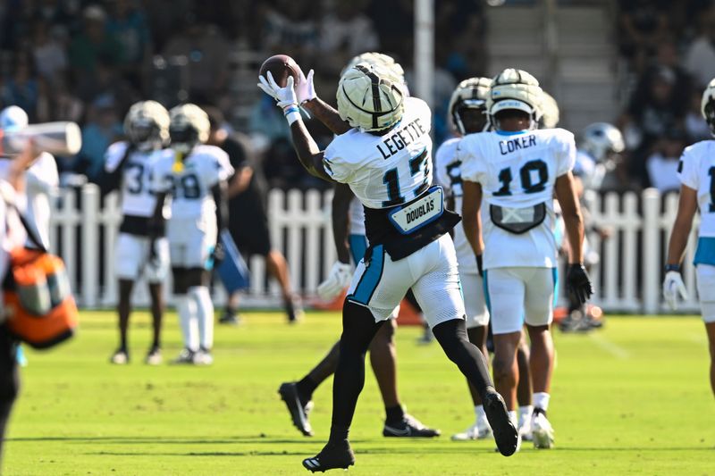 Carolina Panthers wide receiver Xavier Legette (17) makes a catch during an NFL football joint practice with the New York Jets Thursday, Aug. 15, 2024, in Charlotte, N.C. (AP Photo/Matt Kelley)