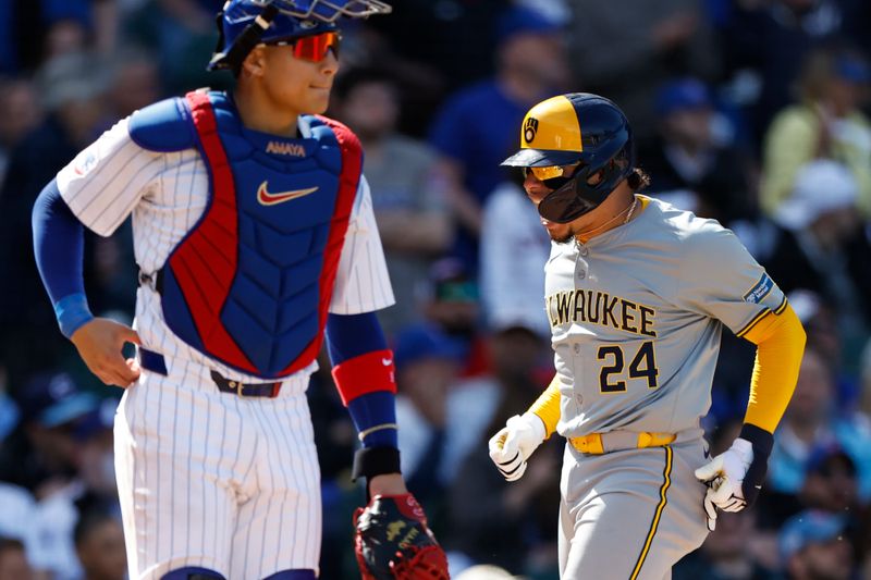 May 3, 2024; Chicago, Illinois, USA; Milwaukee Brewers catcher William Contreras (24) scores against the Chicago Cubs during the eight inning at Wrigley Field. Mandatory Credit: Kamil Krzaczynski-USA TODAY Sports