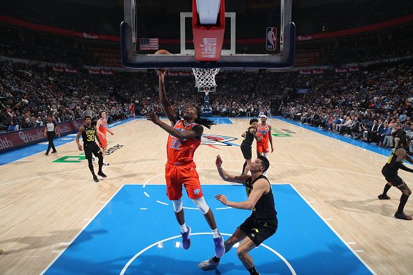 OKLAHOMA CITY, OK - DECEMBER 11: Cason Wallace #22 of the Oklahoma City Thunder drives to the basket during the game against the Utah Jazz on December 11, 2023 at Paycom Arena in Oklahoma City, Oklahoma. NOTE TO USER: User expressly acknowledges and agrees that, by downloading and or using this photograph, User is consenting to the terms and conditions of the Getty Images License Agreement. Mandatory Copyright Notice: Copyright 2023 NBAE (Photo by Zach Beeker/NBAE via Getty Images)