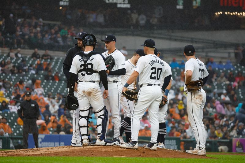 Sep 28, 2024; Detroit, Michigan, USA; The Detroit Tigers huddle on the mound during the fifth inning against the Chicago White Sox at Comerica Park. Mandatory Credit: Brian Bradshaw Sevald-Imagn Images