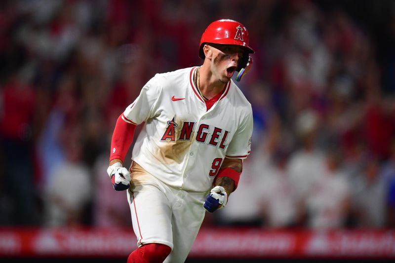 August 3, 2024; Anaheim, California, USA; Los Angeles Angels shortstop Zach Neto (9) reacts after hitting a three run home run against the New York Mets during the seventh inning at Angel Stadium. Mandatory Credit: Gary A. Vasquez-USA TODAY Sports